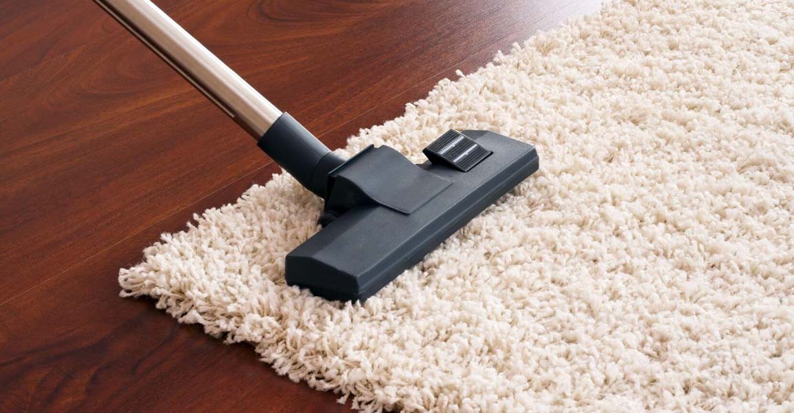 Aspirateur sur un tapis