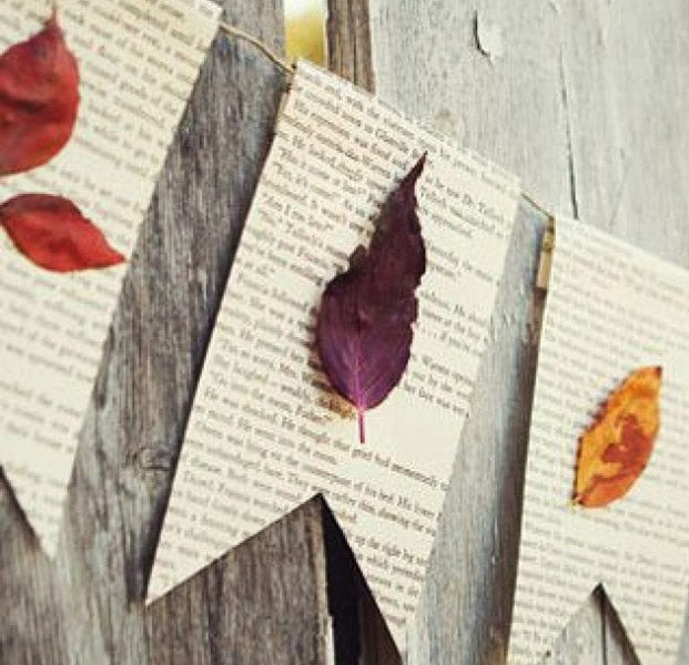 Décoration murale avec des pages de livres découpées