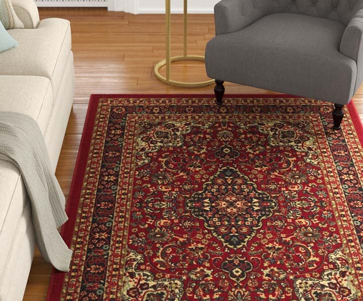 Tapis rouge synthétique en nylon dans un salon